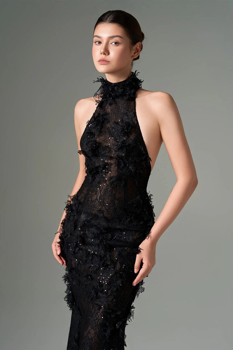 Close-up of Aylin black lace mermaid dress – halter neckline and delicate 3D floral lace details by RESSALINA